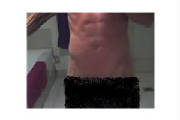 Guy's abdominal photo in restroom.